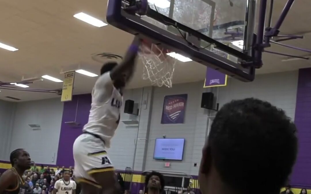 LSUA’s Kashie Natt hammers down the Alley Oop from Isaiah Howard vs the Pilots of LSUS